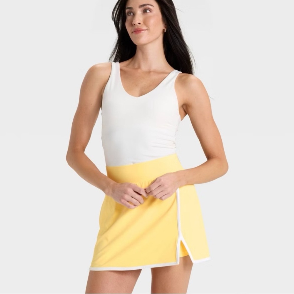 All in Motion Yellow Midi skort  size XL. 
New with tags.